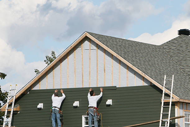 Professional Vinyl Siding technician working in Baltic, CT